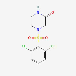 molecular formula C10H10Cl2N2O3S B13934117 4-((2,6-Dichlorophenyl)sulfonyl)piperazin-2-one 