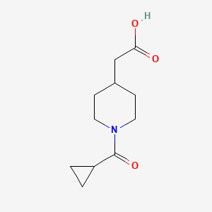 B1393606 [1-(Cyclopropylcarbonyl)piperidin-4-yl]acetic acid CAS No. 1284415-59-3