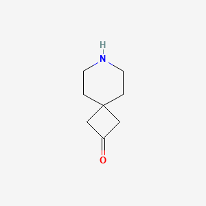 molecular formula C8H13NO B1393735 7-Azaspiro[3.5]nonan-2-one CAS No. 1365570-36-0