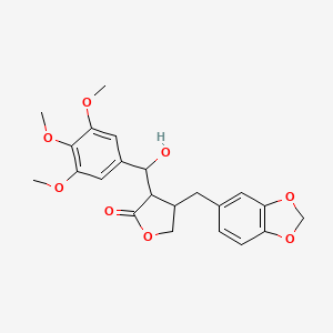 molecular formula C22H24O8 B13937524 4-[(2H-1,3-Benzodioxol-5-yl)methyl]-3-[hydroxy(3,4,5-trimethoxyphenyl)methyl]oxolan-2-one CAS No. 17187-82-5