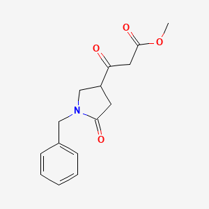 molecular formula C15H17NO4 B1394391 Methyl 3-(1-benzyl-5-oxopyrrolidin-3-yl)-3-oxopropanoate CAS No. 1229625-28-8