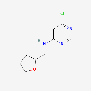 molecular formula C9H12ClN3O B1394830 6-Chloro-N-(tetrahydro-2-furanylmethyl)-4-pyrimidinamine CAS No. 872512-18-0