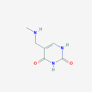 molecular formula C6H9N3O2 B13956961 5-methylaminomethyl-1H-pyrimidine-2,4-dione 