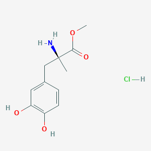 molecular formula C11H16ClNO4 B139600 methyl (2S)-2-amino-3-(3,4-dihydroxyphenyl)-2-methylpropanoate;hydrochloride CAS No. 115054-62-1