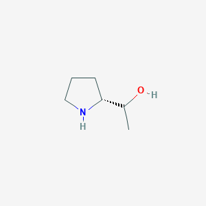 molecular formula C6H13NO B1396158 1-[(2R)-pyrrolidin-2-yl]ethanol CAS No. 848482-38-2