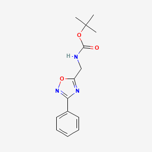 molecular formula C14H17N3O3 B1396386 tert-butyl N-[(3-phenyl-1,2,4-oxadiazol-5-yl)methyl]carbamate CAS No. 1053656-50-0