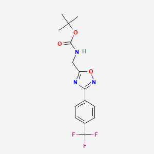 molecular formula C15H16F3N3O3 B1396396 5-(tert-Butyloxycarbonyamino)methyl-3-(4-(trifluoromethyl)phenyl)-[1,2,4]oxadiazole CAS No. 1053656-56-6