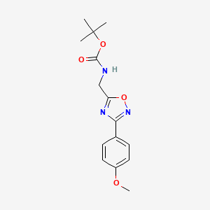 molecular formula C15H19N3O4 B1396408 5-(tert-Butyloxycarbonyamino)methyl-3-(4-methoxyphenyl)-[1,2,4]oxadiazole CAS No. 1053656-59-9