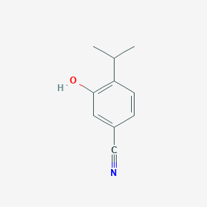 molecular formula C10H11NO B13965712 Benzonitrile, 3-hydroxy-4-isopropyl- 