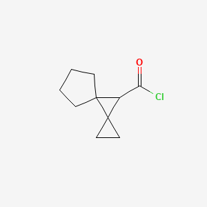 molecular formula C10H13ClO B13966591 Dispiro[2.0.4~4~.1~3~]nonane-9-carbonyl chloride CAS No. 65313-40-8
