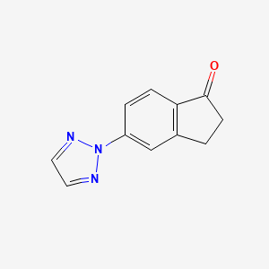 molecular formula C11H9N3O B1396899 5-(2H-1,2,3-Triazol-2-yl)indan-1-one CAS No. 1334784-80-3