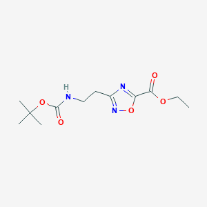 molecular formula C12H19N3O5 B1398633 Ethyl 3-(2-tert-butyloxycarbonylaminoethyl)-[1,2,4]oxadiazole-5-carboxylate CAS No. 1053656-31-7