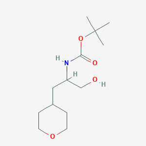molecular formula C13H25NO4 B1398790 tert-butyl N-[1-hydroxy-3-(oxan-4-yl)propan-2-yl]carbamate CAS No. 1889723-28-7