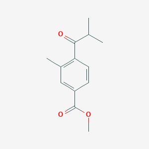 molecular formula C13H16O3 B13992108 Methyl 4-isobutyryl-3-methylbenzoate 