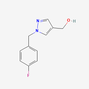 molecular formula C11H11FN2O B1399597 {1-[(4-fluorophenyl)methyl]-1H-pyrazol-4-yl}methanol CAS No. 1094202-70-6