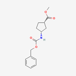 molecular formula C15H19NO4 B1400221 methyl (1S,3R)-3-{[(benzyloxy)carbonyl]amino}cyclopentane-1-carboxylate CAS No. 1421769-37-0