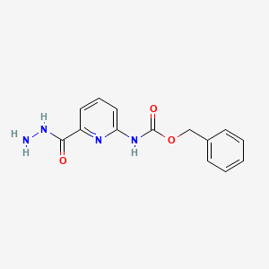 molecular formula C14H14N4O3 B1400654 苄基 6-(肼羰基)吡啶-2-基氨基甲酸酯 CAS No. 1262043-89-9