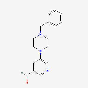 molecular formula C17H19N3O B1402066 5-(4-Benzylpiperazin-1-yl)nicotinaldehyde CAS No. 1779121-89-9