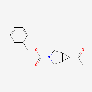 molecular formula C15H17NO3 B14028214 Benzyl 6-acetyl-3-azabicyclo[3.1.0]hexane-3-carboxylate 