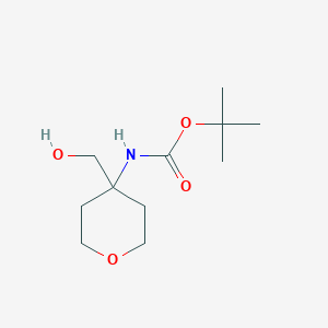 B1403051 tert-butyl N-[4-(hydroxymethyl)oxan-4-yl]carbamate CAS No. 1029716-09-3