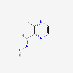 molecular formula C6H7N3O B14032289 N-[(3-methylpyrazin-2-yl)methylidene]hydroxylamine 