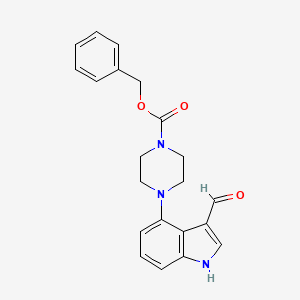 molecular formula C21H21N3O3 B14032638 benzyl 4-(3-formyl-1H-indol-4-yl)-piperazine-1-carboxylate 