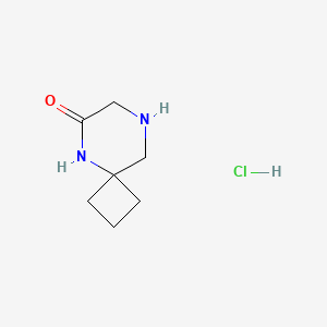 molecular formula C7H13ClN2O B1403475 5,8-二氮杂螺[3.5]壬烷-6-酮盐酸盐 CAS No. 1419101-36-2