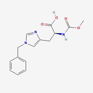 molecular formula C15H17N3O4 B14038095 NT-Benzyl-NA-(methoxycarbonyl)-L-histidine 