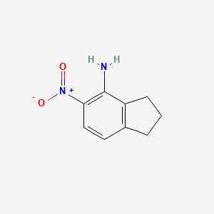 molecular formula C9H10N2O2 B14038326 4-Amino-5-nitroindane 