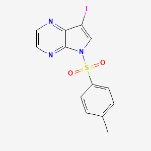 molecular formula C13H10IN3O2S B1404366 7-Iodo-5-[(4-methylphenyl)sulfonyl]-5H-pyrrolo[2,3-B]pyrazine CAS No. 889451-27-8