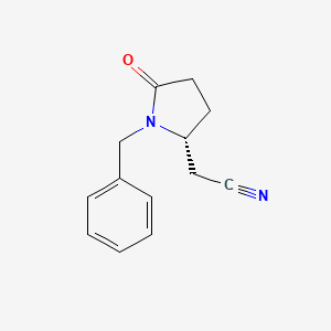 molecular formula C13H14N2O B1404680 (R)-1-Benzyl-5-oxo-pyrrolidin-2-yl acetonitrile CAS No. 1272755-31-3