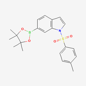 molecular formula C21H24BNO4S B1404694 1-[(4-methylbenzene)sulfonyl]-6-(tetramethyl-1,3,2-dioxaborolan-2-yl)-1H-indole CAS No. 1197026-60-0