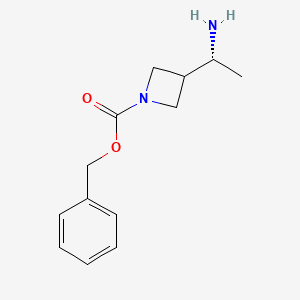 molecular formula C13H18N2O2 B14047027 Benzyl (R)-3-(1-aminoethyl)azetidine-1-carboxylate 