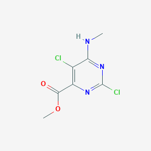 Methyl 2,5-dichloro-6-(methylamino)pyrimidine-4-carboxylate