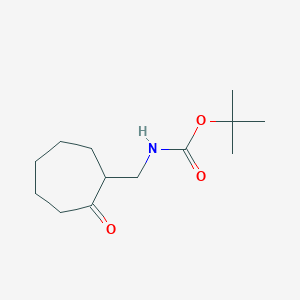 molecular formula C13H23NO3 B1404812 tert-butyl N-[(2-oxocycloheptyl)methyl]carbamate CAS No. 1423031-08-6