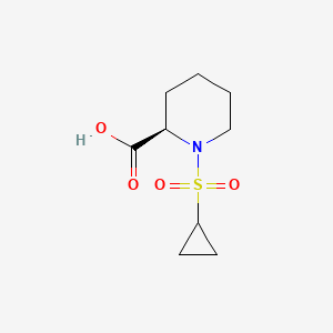 molecular formula C9H15NO4S B1405881 (2R)-1-(cyclopropanesulfonyl)piperidine-2-carboxylic acid CAS No. 1567879-65-5