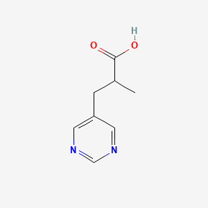 B1405978 2-Methyl-3-(pyrimidin-5-yl)propanoic acid CAS No. 1523383-30-3