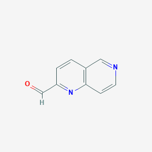 molecular formula C9H6N2O B14061290 1,6-Naphthyridine-2-carbaldehyde 