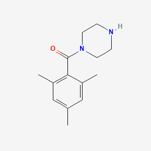 molecular formula C14H20N2O B14066857 Mesityl(piperazin-1-yl)methanone 