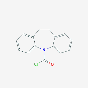 molecular formula C15H12ClNO B140679 10,11-Dihydro-5H-dibenzo[b,f]azepine-5-carbonyl chloride CAS No. 33948-19-5