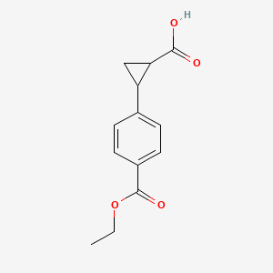 molecular formula C13H14O4 B1407415 trans-4-(2-Carboxycyclopropyl)benzoic acid ethyl ester CAS No. 1597426-80-6