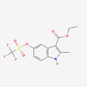 molecular formula C13H12F3NO5S B1408344 Ethyl 2-methyl-5-(((trifluoromethyl)-sulfonyl)-oxy)-1H-indole-3-carboxylate CAS No. 1796574-02-1