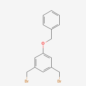 molecular formula C15H14Br2O B14087608 Benzene, 1,3-bis(bromomethyl)-5-(phenylmethoxy)- CAS No. 255872-16-3