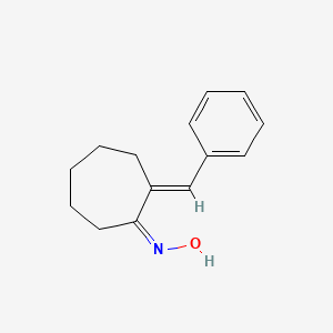 molecular formula C14H17NO B14106553 Cycloheptanone, 2-(phenylmethylene)-, oxime, (E,E)- 