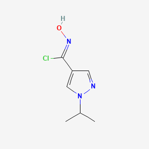 molecular formula C7H10ClN3O B1411789 N-Hydroxy-1-isopropyl-1H-pyrazole-4-carbimidoyl chloride CAS No. 1704318-68-2