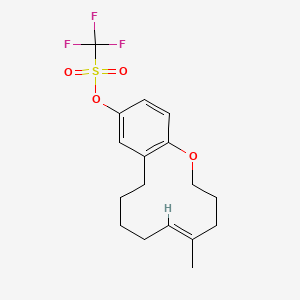 molecular formula C17H21F3O4S B14125382 Methanesulfonic acid, 1,1,1-trifluoro-, (5E)-3,4,7,8,9,10-hexahydro-5-Methyl-2H-1-benzoxacyclododecin-12-yl ester 