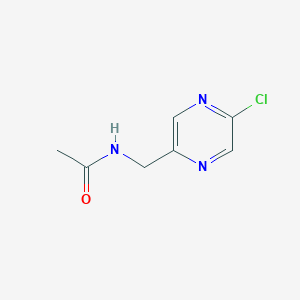 molecular formula C7H8ClN3O B1413096 N-((5-Chloropyrazin-2-yl)methyl)acetamide CAS No. 1956367-01-3