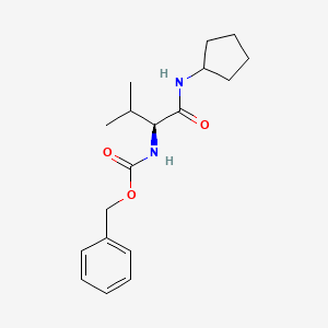 molecular formula C18H26N2O3 B1416541 苄基 N-[(1S)-1-(环戊基甲酰氨基)-2-甲基丙基]氨基甲酸酯 CAS No. 1423037-55-1