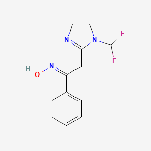 molecular formula C12H11F2N3O B1416590 N-{2-[1-(difluoromethyl)-1H-imidazol-2-yl]-1-phenylethylidene}hydroxylamine CAS No. 929974-05-0