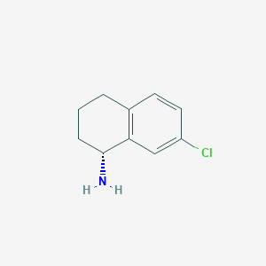 molecular formula C10H12ClN B1416631 (1R)-7-氯-1,2,3,4-四氢萘胺 CAS No. 1055949-63-7